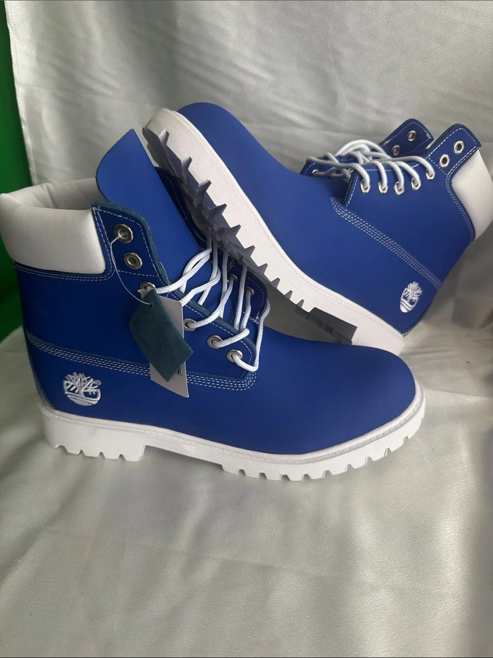 New! Timberland Premium 6-Inch boots featuring a vibrant blue nubuck upper.